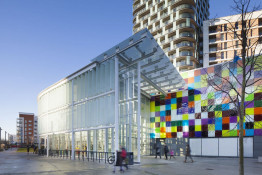 The Glass Mill Leisure Centre is situated on the lowest three floors of a 27 storey apartment building in Lewisham. The leisure centre includes 1400 glass panels in ten colours illuminated from behind. The lighting responds to the sounds outside of the centre. The new facility was designed by LA Architects and is managed by Fusion Lifestyle on behalf of Lewisham Council. The contractor for the project was Pellikaan, with additional work coming from Barratt Homes. The new centre features a 100-station fitness suite, a 25m, 8-lane swimming pool, a teaching pool, two group exercise studios, a rock climbing wall, a crèche, café and health suite, which includes a sauna, steam room, ice room and a relaxation area.