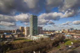 The Glass Mill Leisure Centre is situated on the lowest three floors of a 27 storey apartment building in Lewisham. The leisure centre includes 1400 glass panels in ten colours illuminated from behind. The lighting responds to the sounds outside of the centre. The new facility was designed by LA Architects and is managed by Fusion Lifestyle on behalf of Lewisham Council. The contractor for the project was Pellikaan, with additional work coming from Barratt Homes. The new centre features a 100-station fitness suite, a 25m, 8-lane swimming pool, a teaching pool, two group exercise studios, a rock climbing wall, a crèche, café and health suite, which includes a sauna, steam room, ice room and a relaxation area.